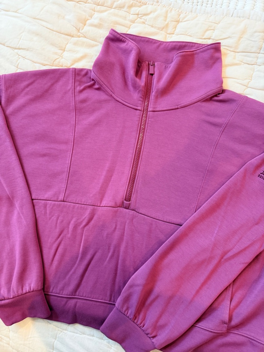 Travis Matthew’s Skyloft Soft Half Zip Pullover in Berry Pink